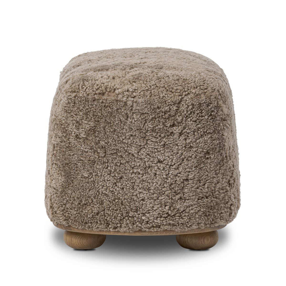 Pouf ovale Bilbury à quatre mains en peau lainée taupe