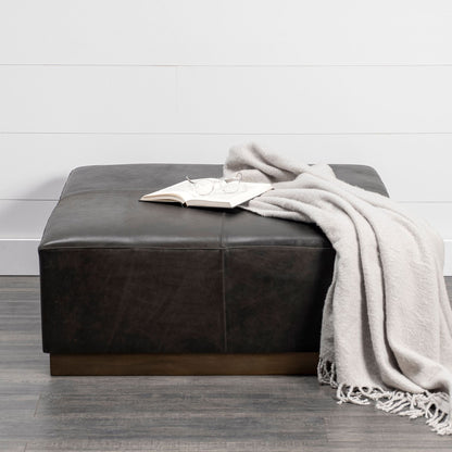 Ottoman Milo en cuir noir foncé 